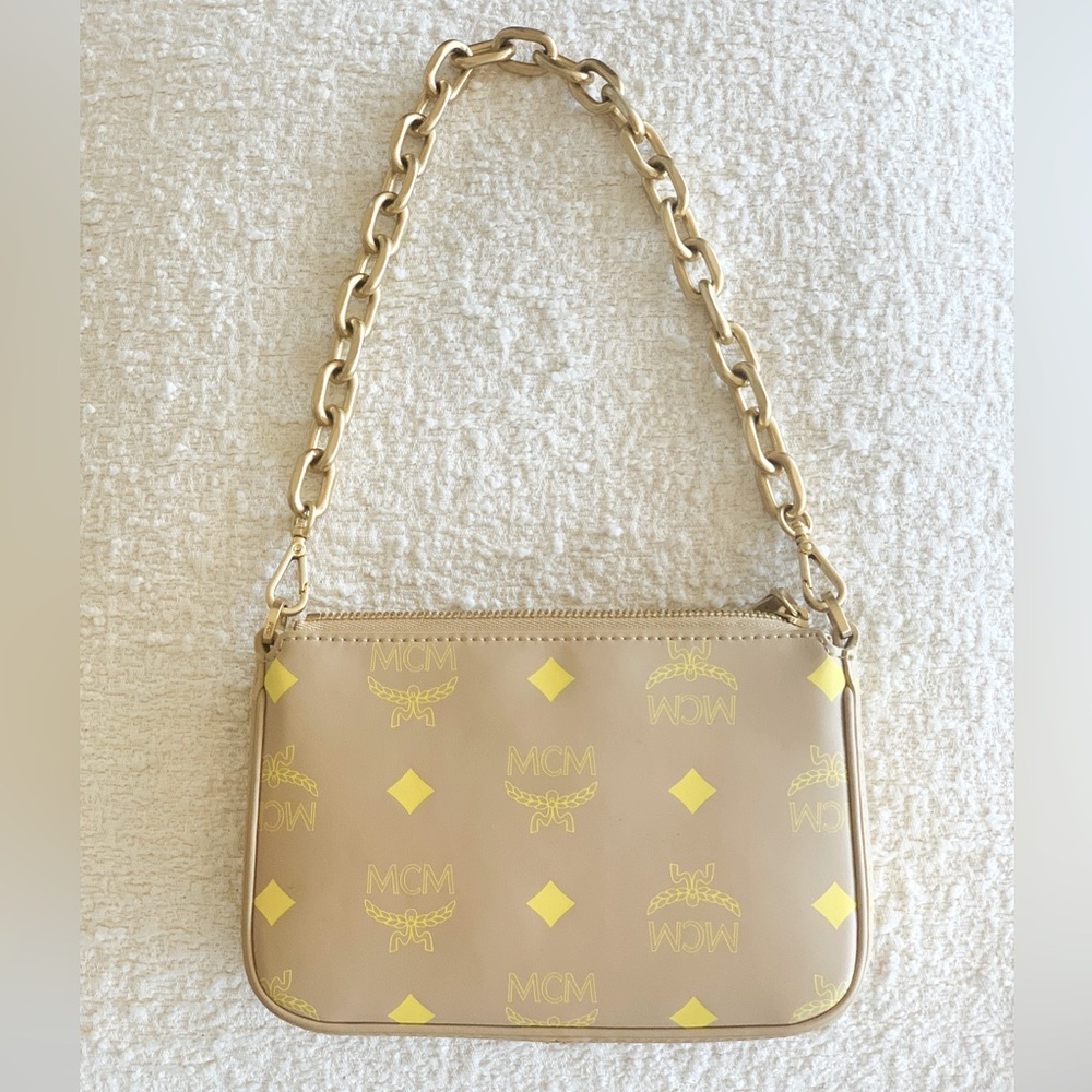 MCM Mini Color Splash shoulder bag in “croissant” with neon yellow accents